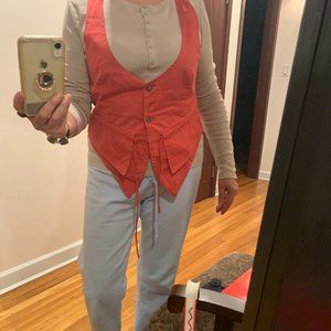 Contemporary vest, red with stripes, cotton. Deeply open on the front.